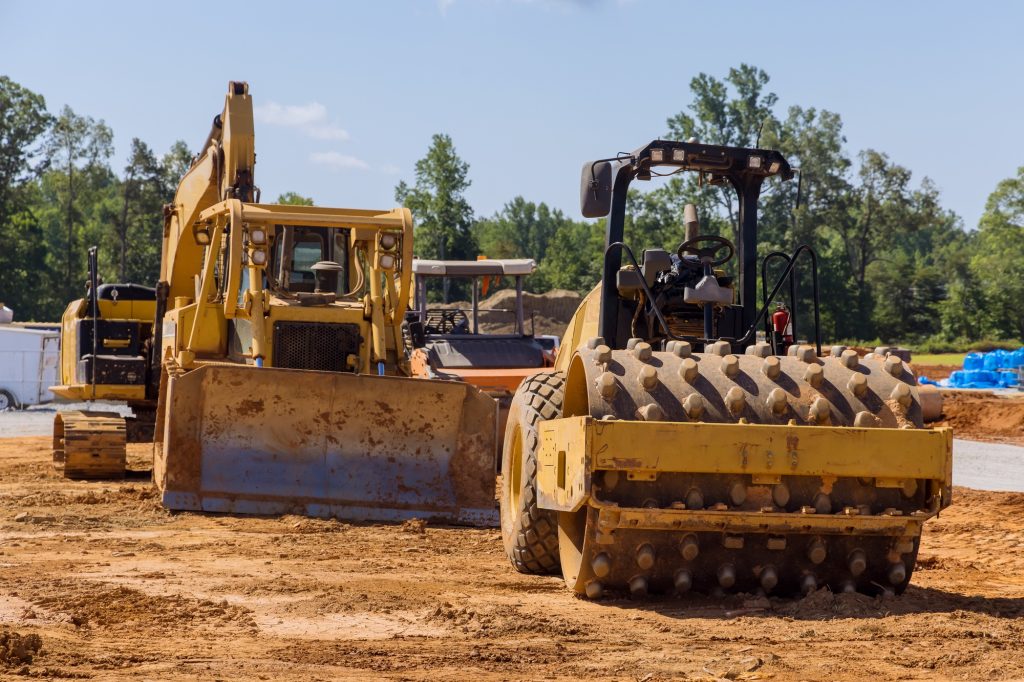 Excavator tractor equipment construction works on using at a construction site
